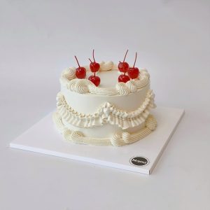 White draped cake